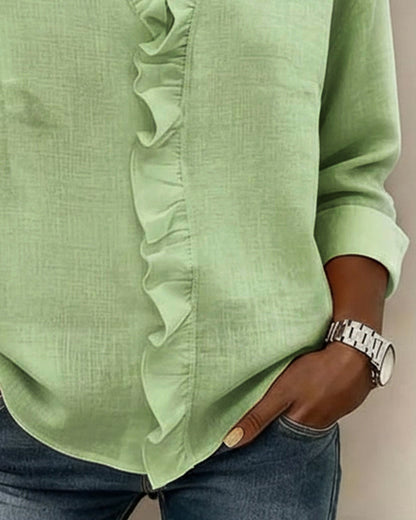 Elegant rysjebluse i pustende linmiks